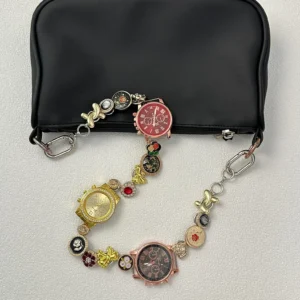 Chrome Y2K futuristic watch bag chain styled by G-Dragon