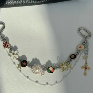 Chrome gothic festival watch bag chain styled by Dua Lipa