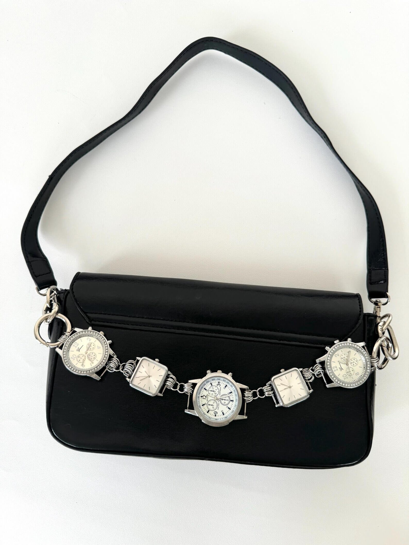 Minimalist silver bag chain styled by Hailey Bieber