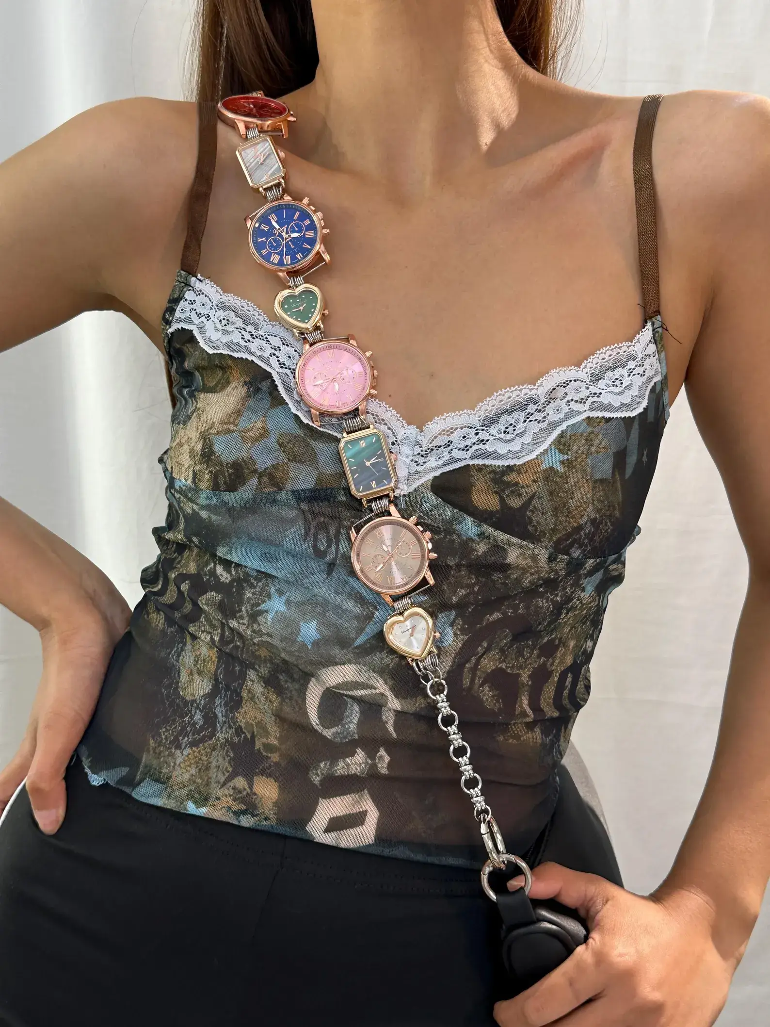 Minimalist stainless steel watch bag chain styled by Hailey Bieber