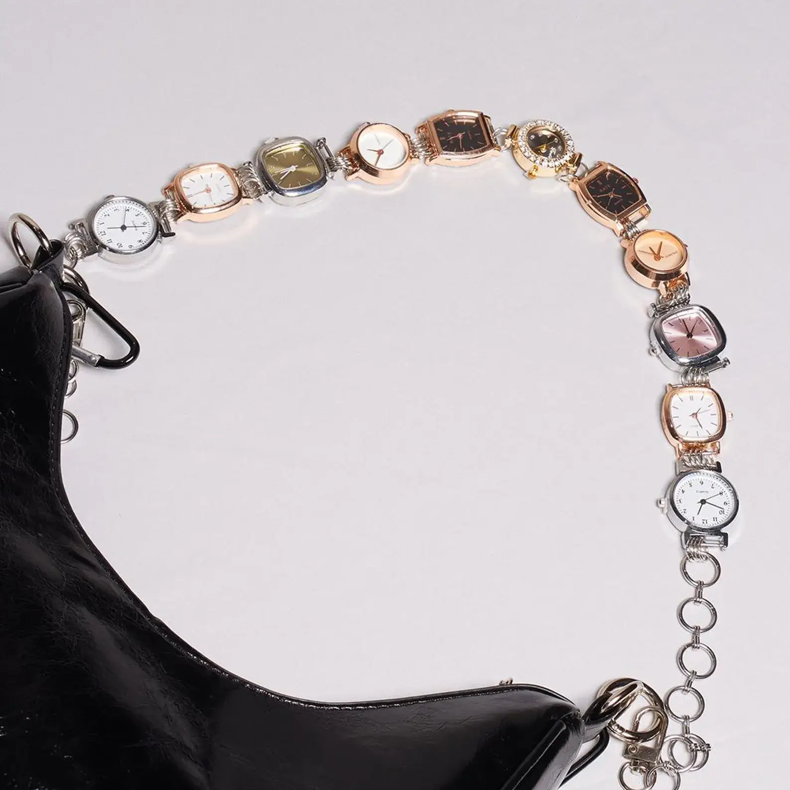Instagram fashion cyberpunk watch bag chain: Futuristic silver and black chain with geometric or circuit-inspired links, glowing LED accents (optional), worn as a bold watch strap and attached to a transparent techwear bag, capturing the essence of digital-age street style.