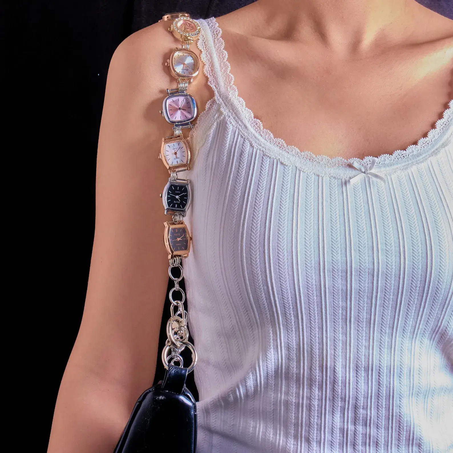 Gothic Rick Owens black watch bag chain: Matte black heavy-duty chain with signature Rick Owens design elements, adjustable length, worn as a watch strap or attached to bags, exuding dark elegance and edgy sophistication.