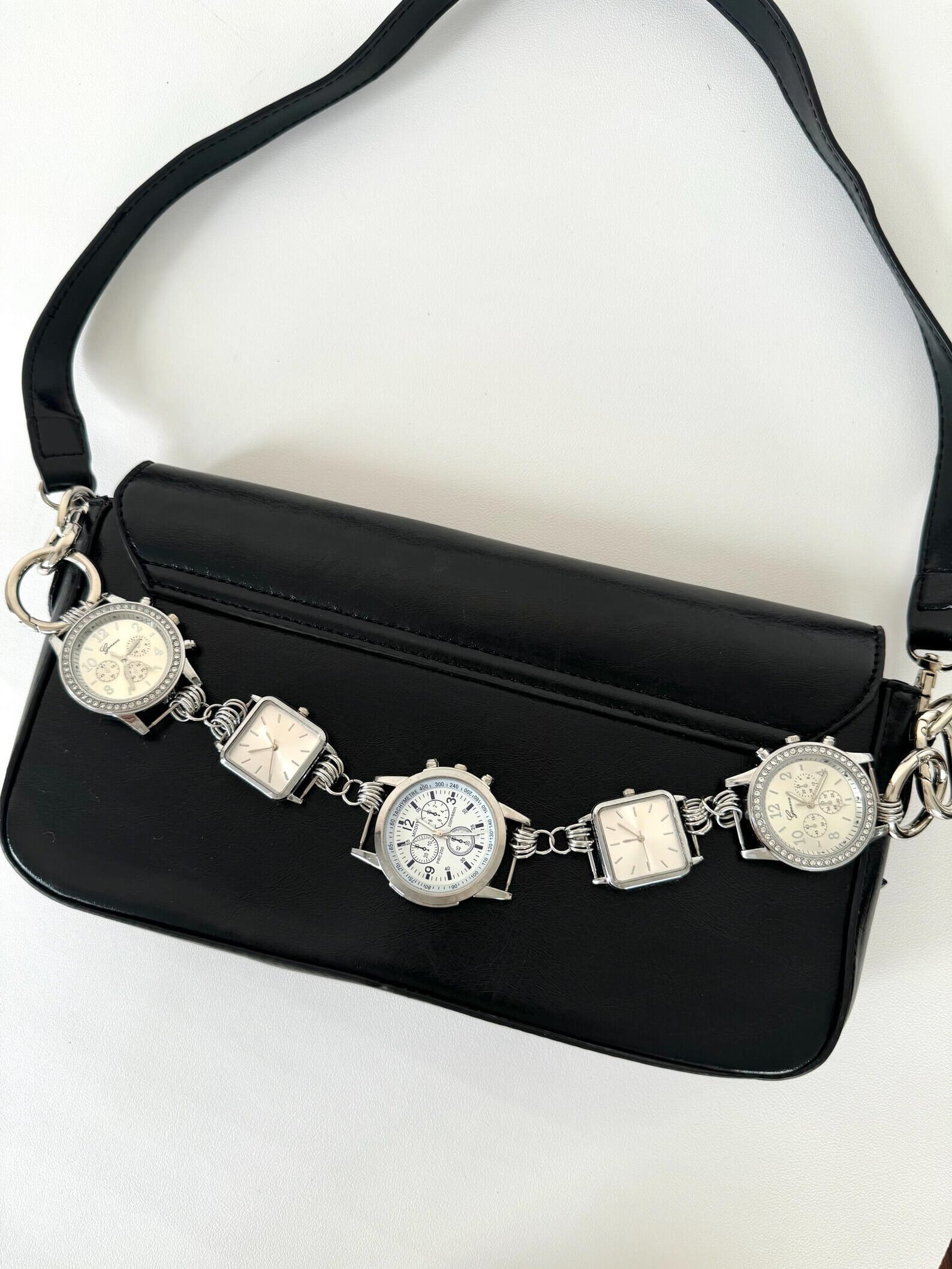 Minimalist silver bag chain styled by Hailey Bieber