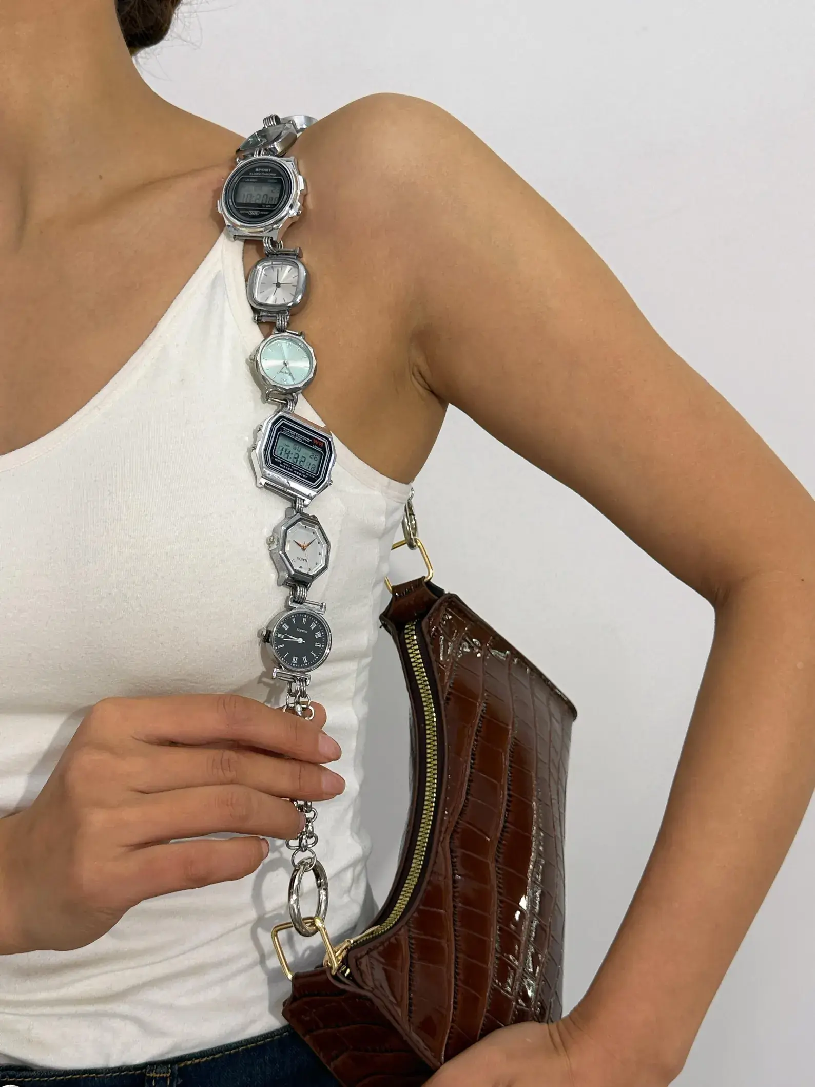 Gothic punk silver bag chain styled by Travis Scott