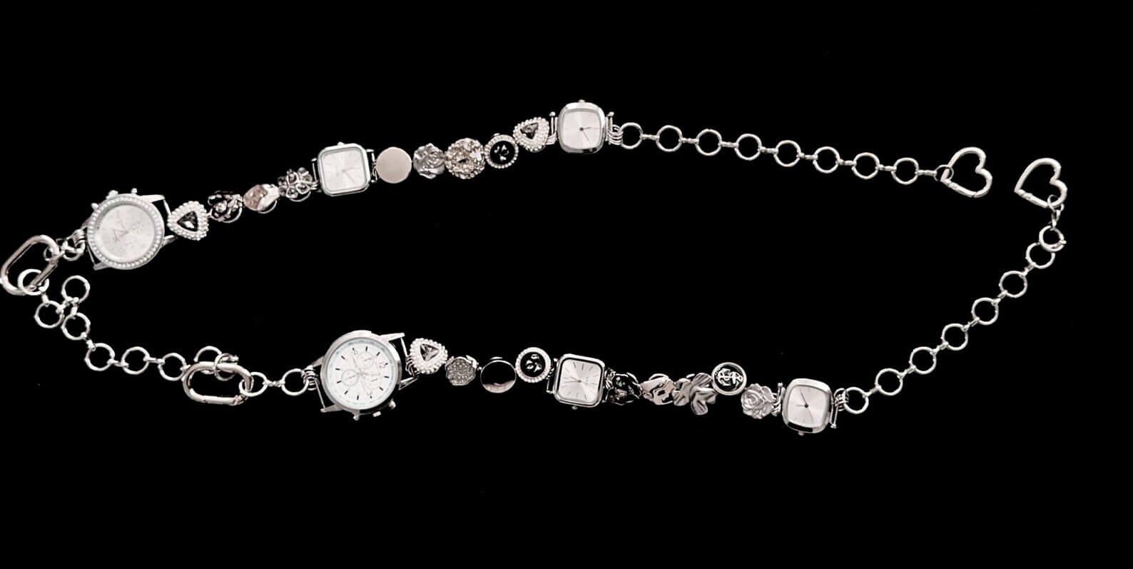 Steampunk silver watch bag chain styled by G-Dragon