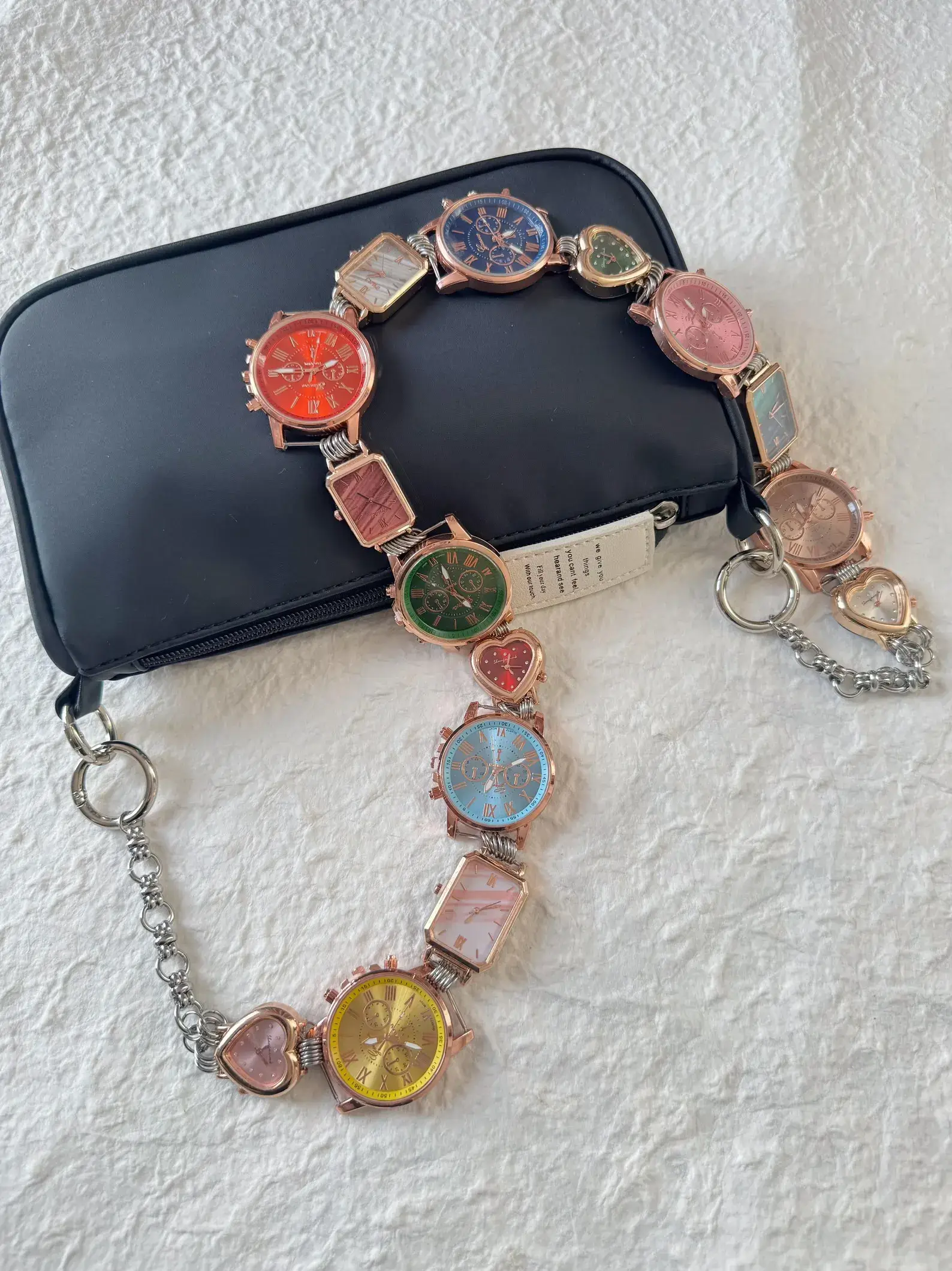 Minimalist stainless steel watch bag chain styled by Hailey Bieber
