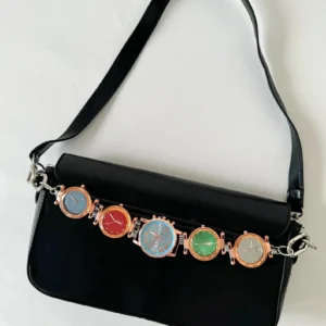 Chrome cyberpunk watch bag chain styled by Billie Eilish