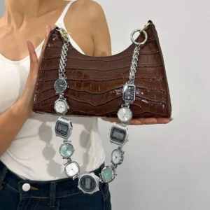 Gothic punk silver bag chain styled by Travis Scott