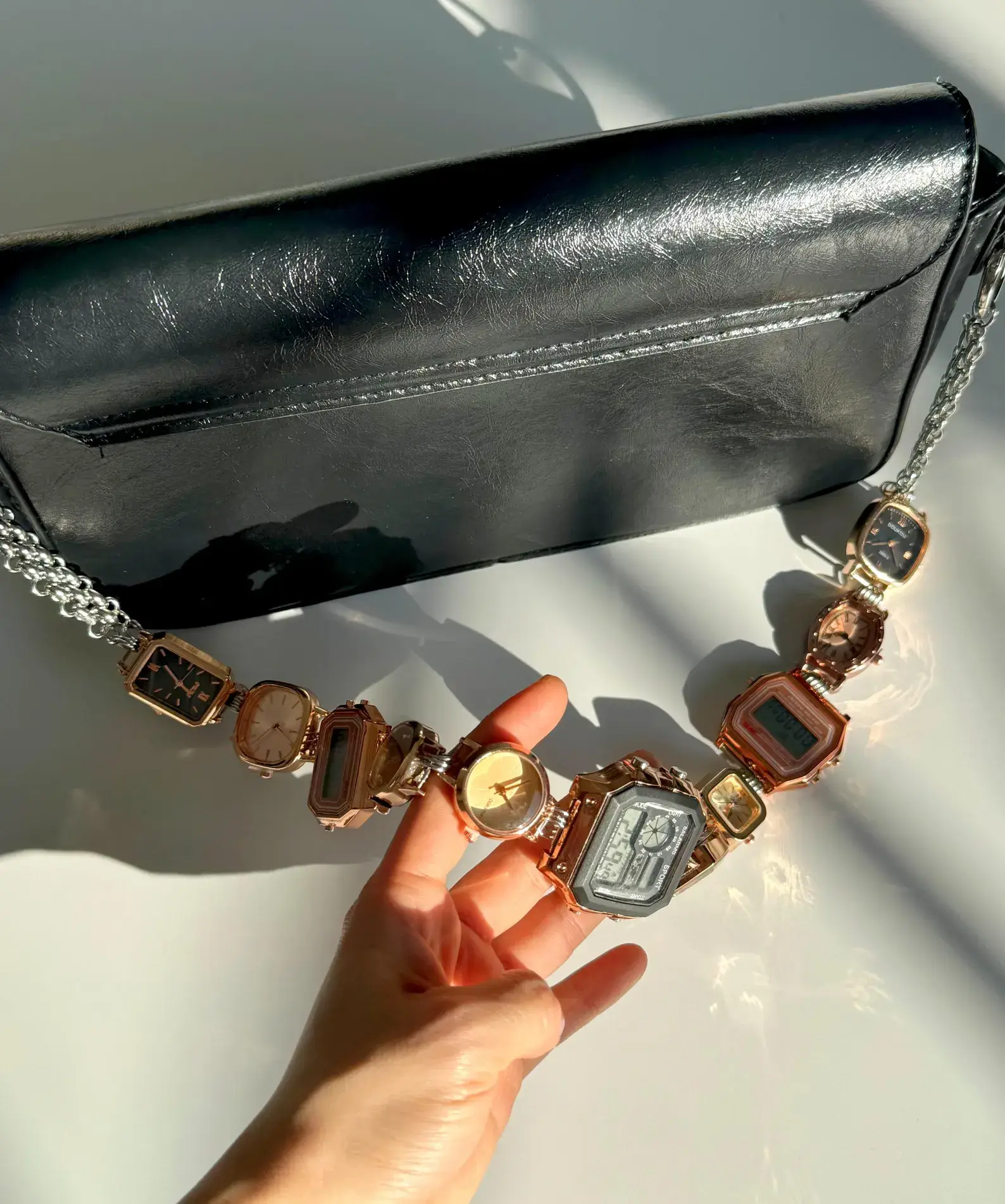 Elegant pearl watch bag chain styled by Bella Hadid