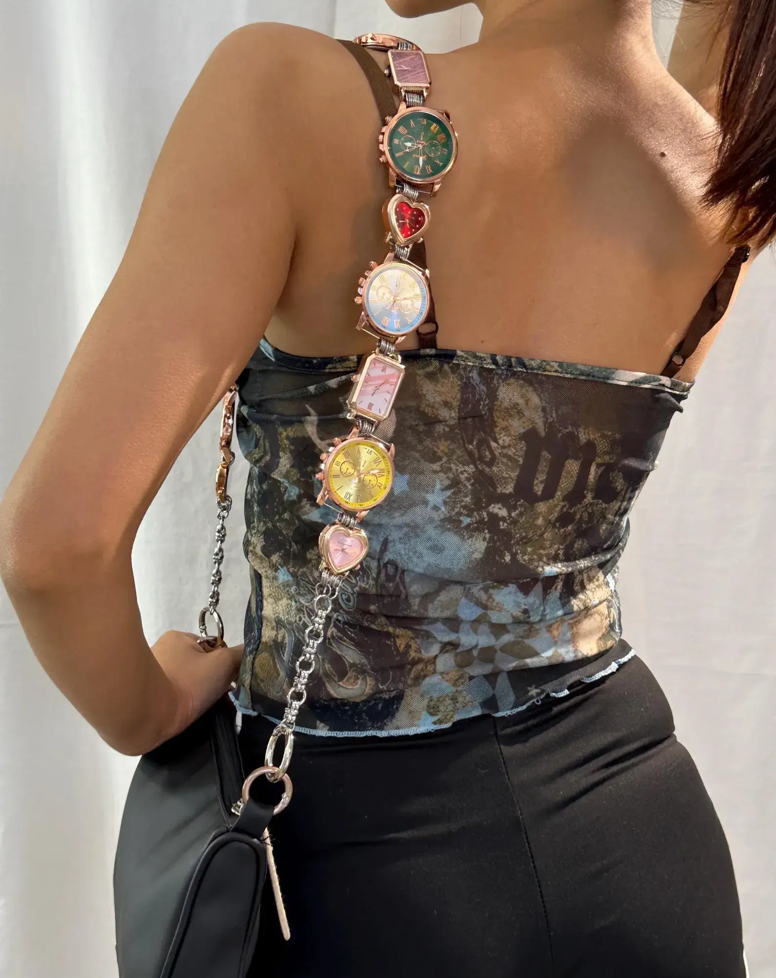 Minimalist stainless steel watch bag chain styled by Hailey Bieber